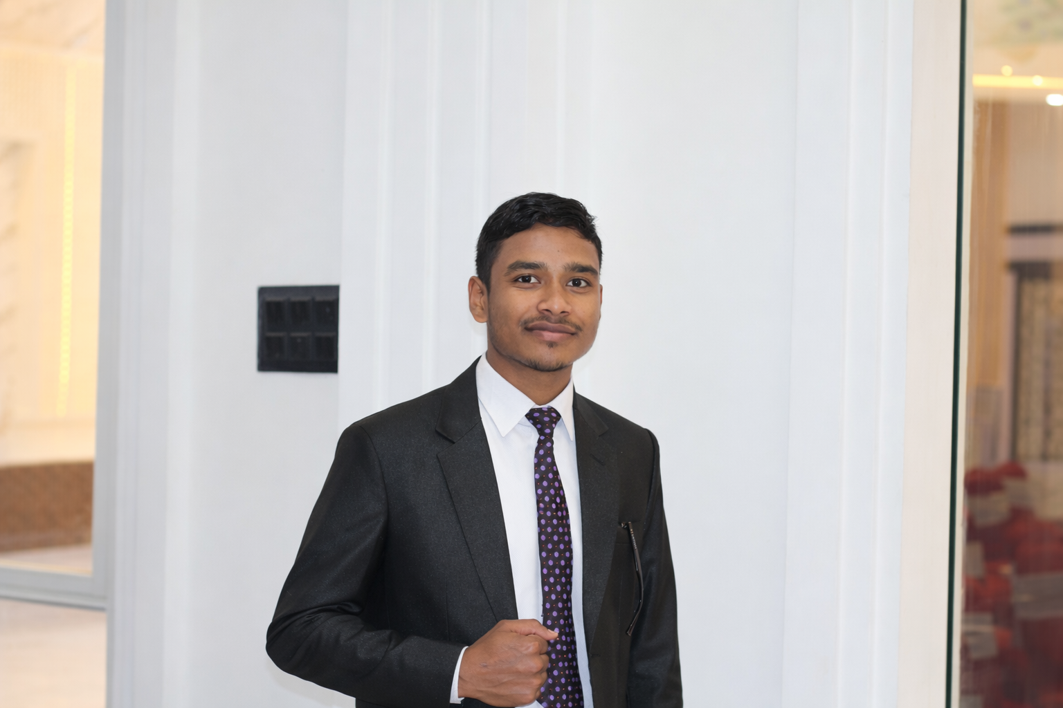 Shivam Sah in formal attire